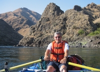 Professor Krumpe rowing on the Lower Salmon River, Idaho